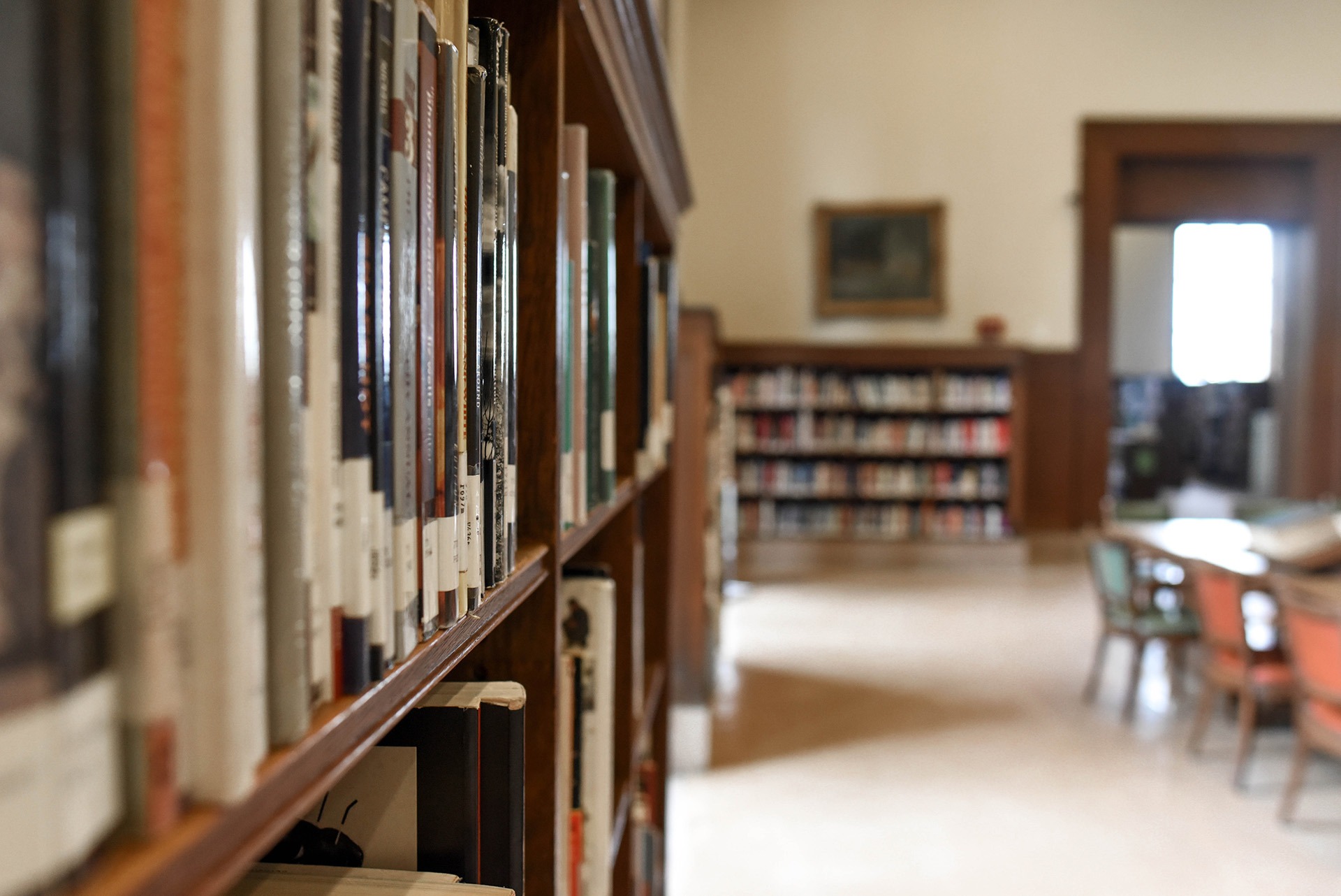 Library shelves stacked with books.